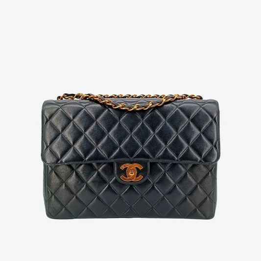 c337-chanel-vintage-black-lambskin-jumbo-classic-flap-bag