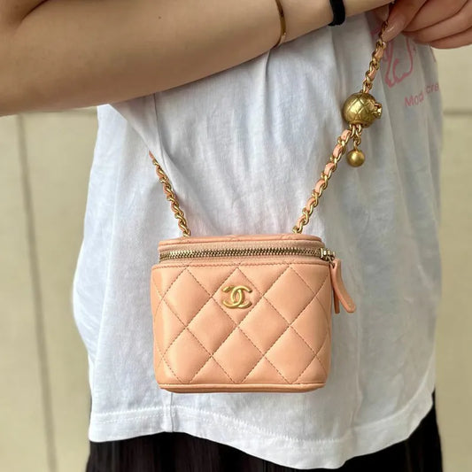 C588 - CHANEL Pink Lambskin Mini Vanity Case Bag (Gold Ball)