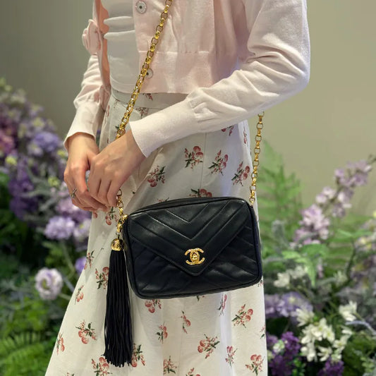 C643 - CHANEL Vintage Black Lambskin Chevron Gold Chain Camera Bag