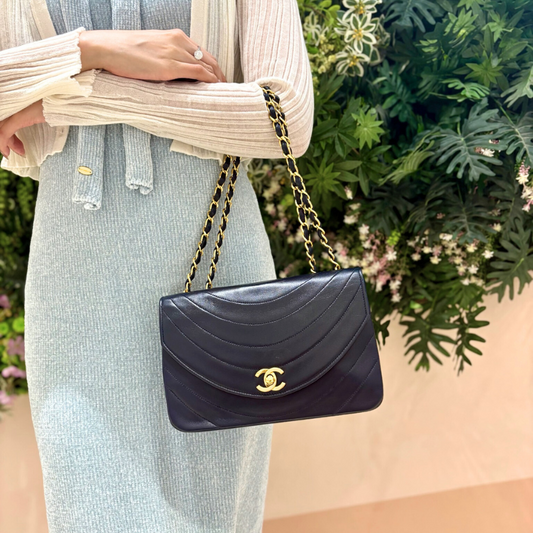 RG473 - CHANEL Vintage Navy Lambskin Half Moon Flap Bag