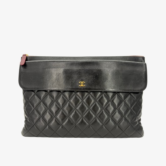 RG370 - CHANEL Vintage Black Lambskin Zip And Flap Clutch Bag