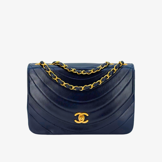 RG473 - CHANEL Vintage Navy Lambskin Half Moon Flap Bag