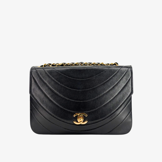 CS004 - CHANEL Vintage Black Lambskin Half Moon Wave Flap Bag
