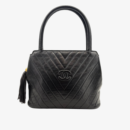 RG432 - CHANEL Vintage Black Lambskin Chevron Handbag