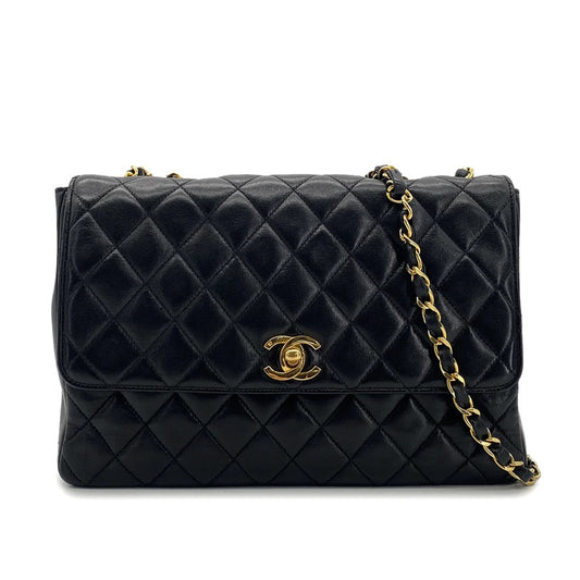 90301699 - CHANEL VINTAGE Black Lambskin Flap Bag