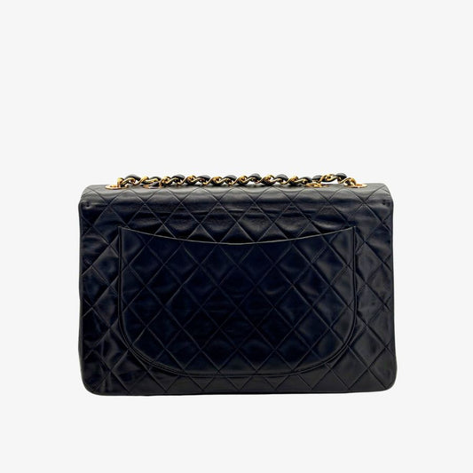 JAH231 - CHANEL Vintage Black Lambskin Maxi Classic Flap Bag