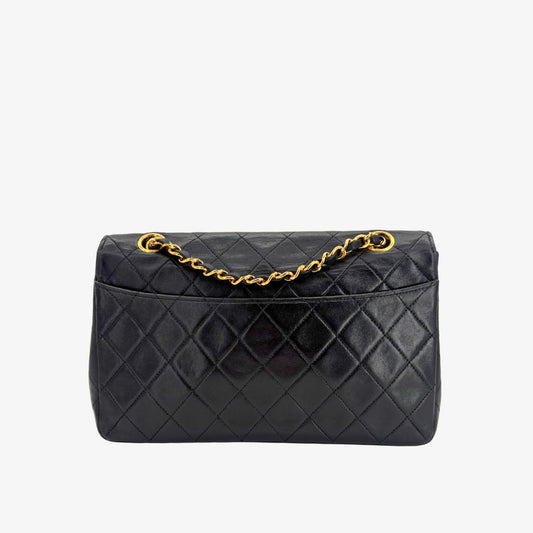 JU907 - CHANEL Vintage Black Lambskin Quilted Flap Bag