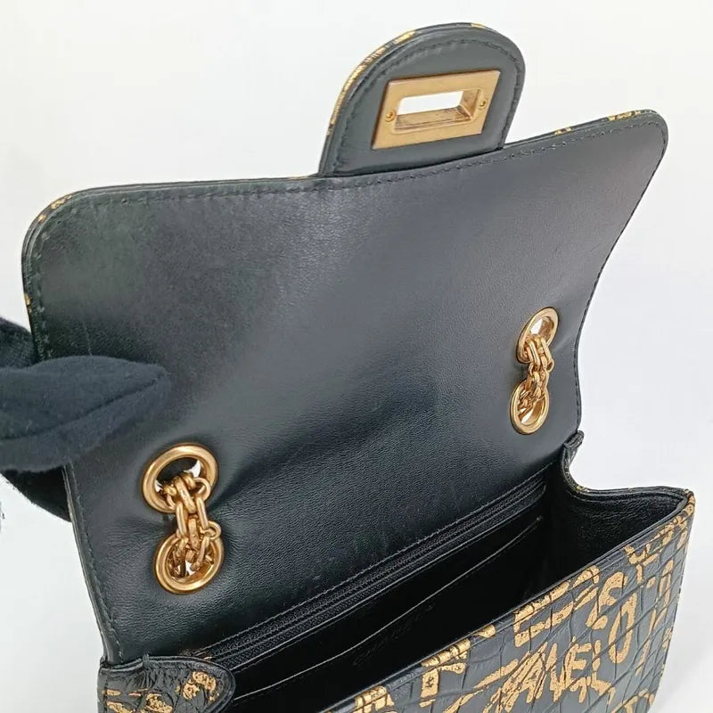90190312-chanel-black-and-gold-graffiti-calfskin-crocodile-embossed-255-flap-bag