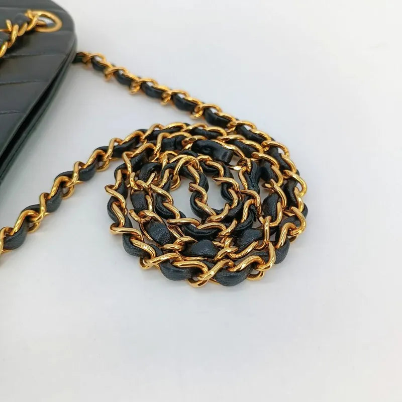 js707-chanel-vintage-black-lambskin-chevron-handbag