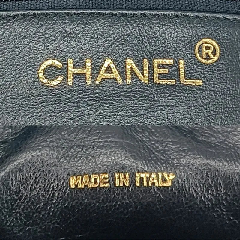 jr668-chanel-vintage-black-lambskin-tassel-camera-bag