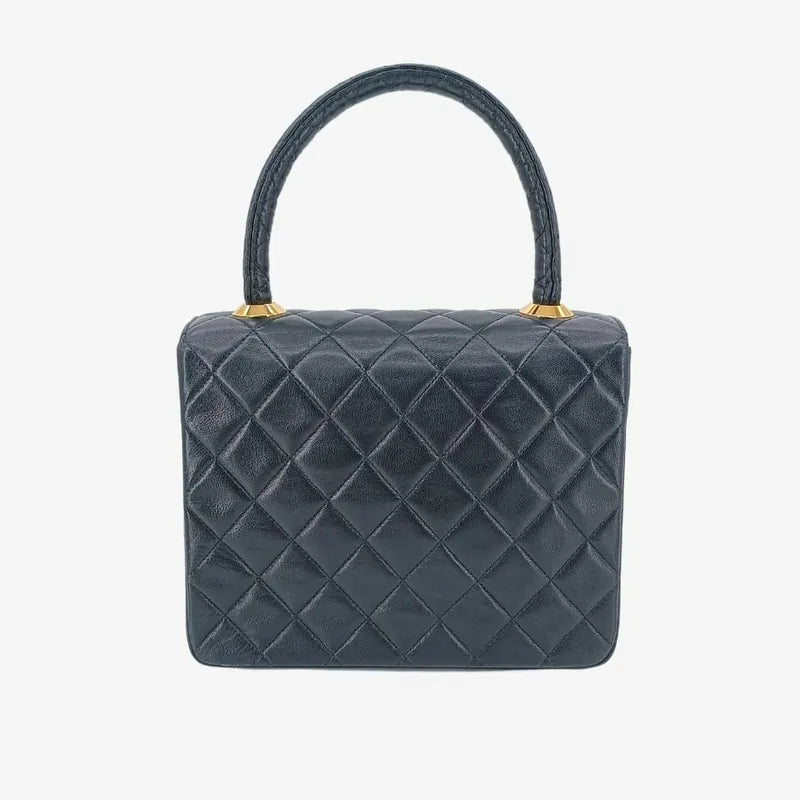 ra015-chanel-vintage-black-lambskin-quilted-handbag