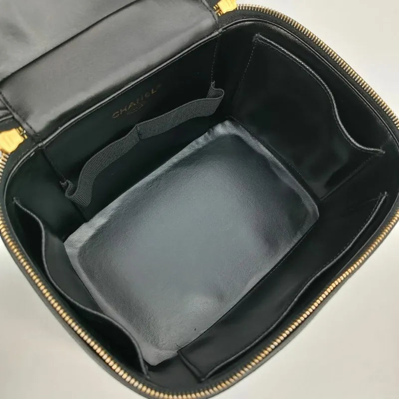 js502-chanel-vintage-black-caviar-embossed-logo-cosmetic-bag