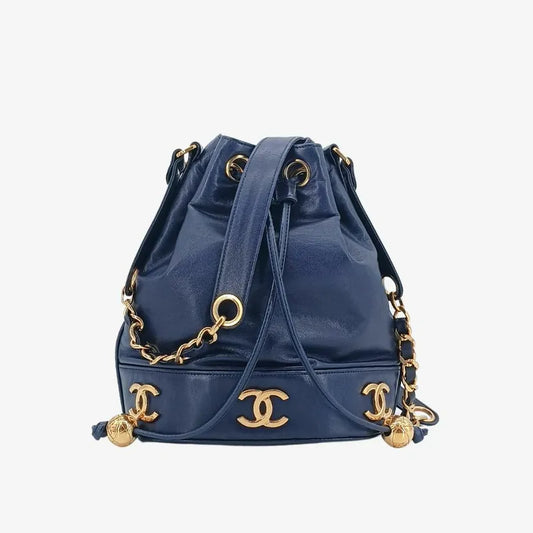 jah154-chanel-vintage-navy-lambskin-gold-ball-bucket-bag