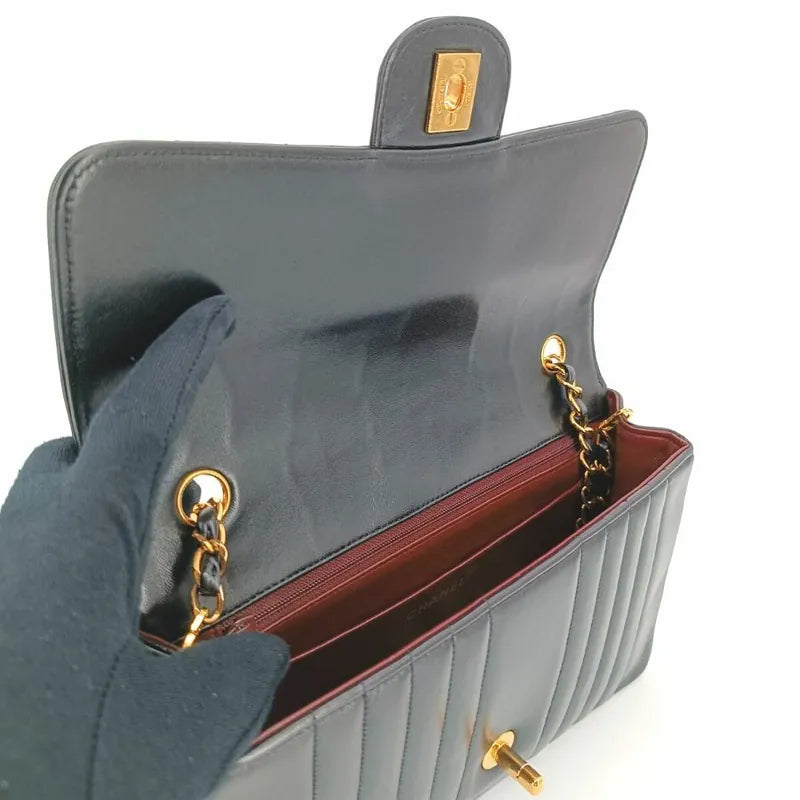 ra345-chanel-vintage-black-lambskin-vertical-flap-bag