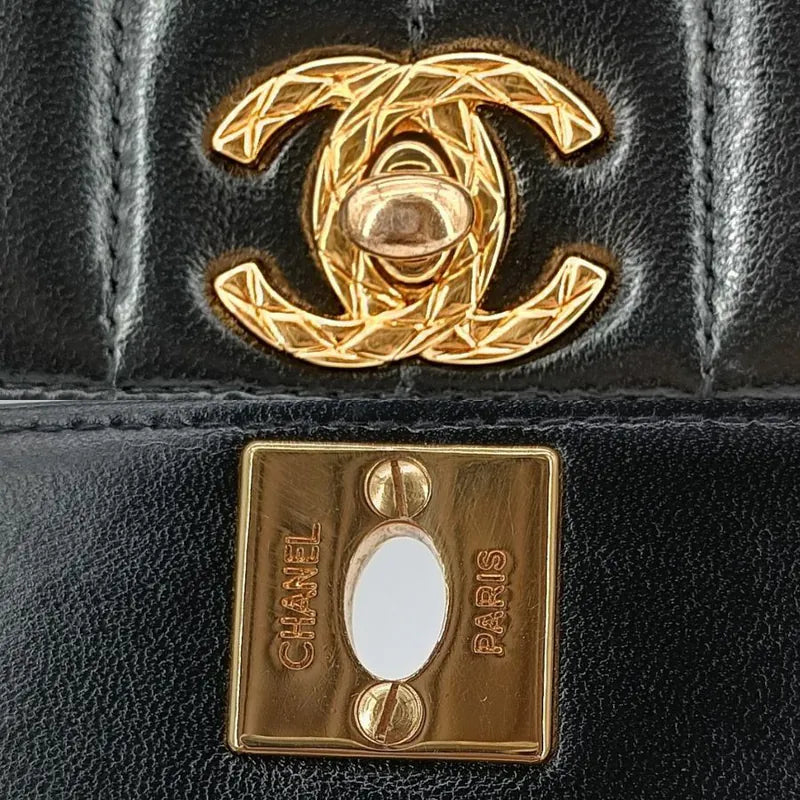 ju296-chanel-vintage-black-lambskin-vertical-gold-chain-flap-bag