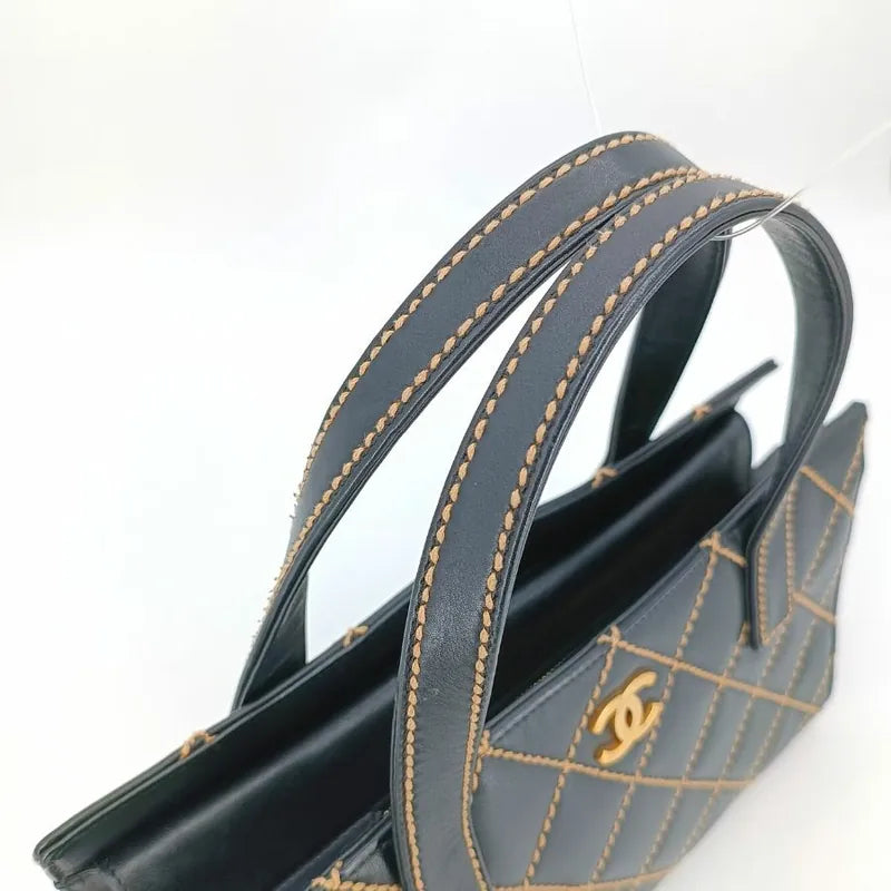 jt415-chanel-vintage-black-calfskin-wild-stitch-handbag