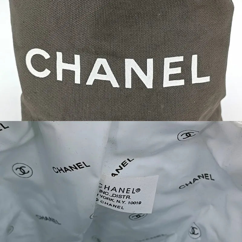 jt450-chanel-black-cotton-mini-backpack