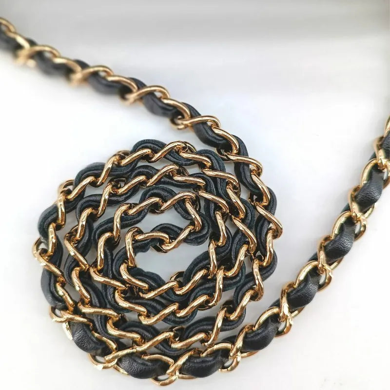 90173728-chanel-vintage-black-canvas-coco-print-flap-bag