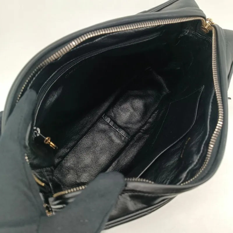 jr668-chanel-vintage-black-lambskin-tassel-camera-bag