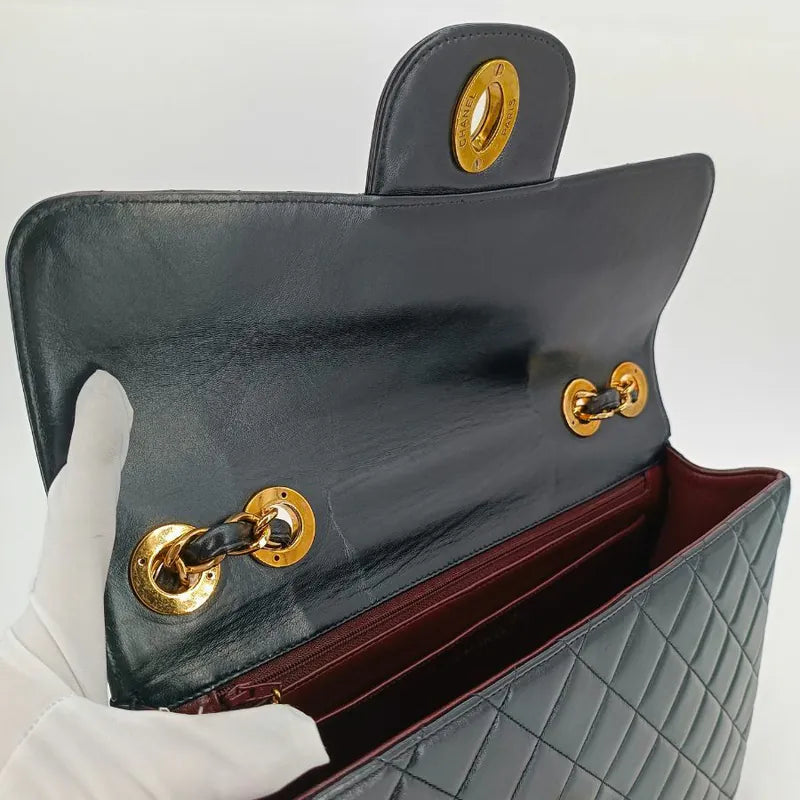 ra162-chanel-vintage-black-lambskin-jumbo-classic-flap-bag