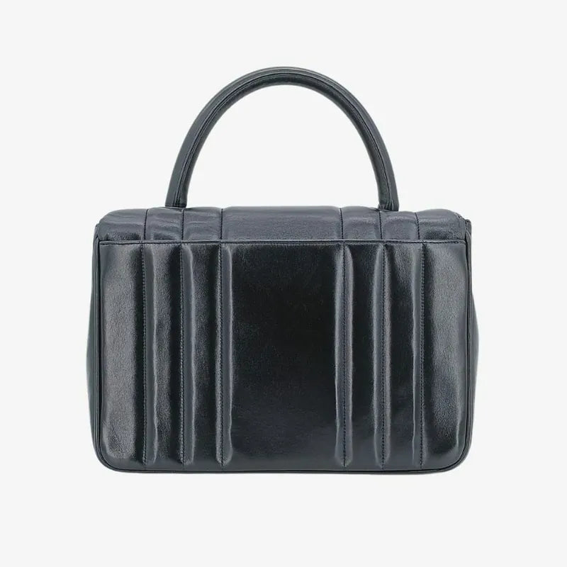 ra658-chanel-vintage-black-lambskin-vertical-flap-handbag