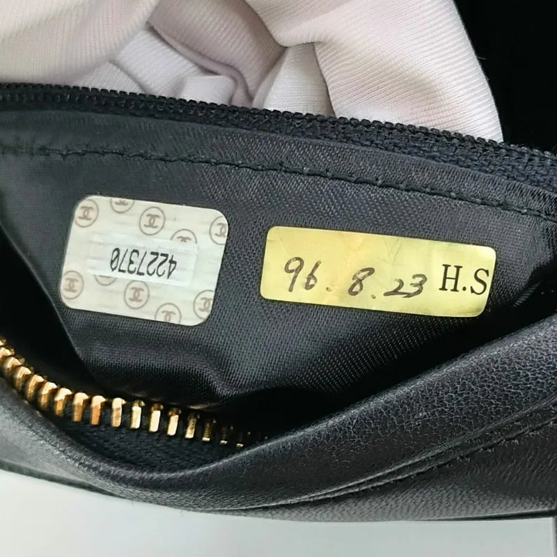 ra717-chanel-vintage-black-lambskin-quilted-handbag