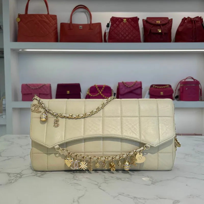 c538-chanel-vintage-beige-lambskin-chocolate-bar-charms-flap-bag