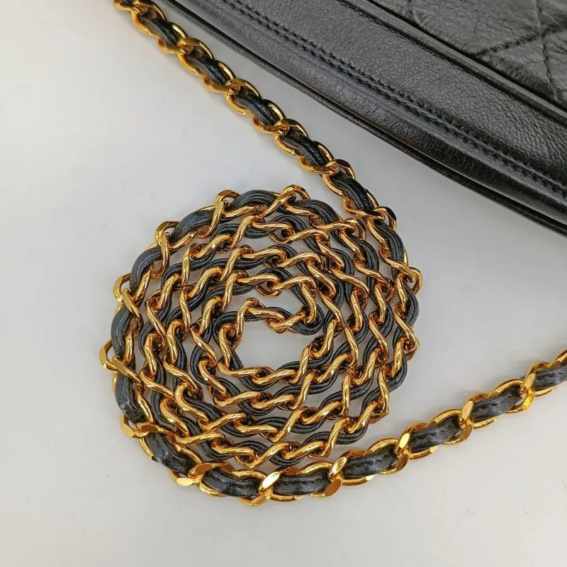 jah131-chanel-vintage-black-lambskin-tassel-camera-bag