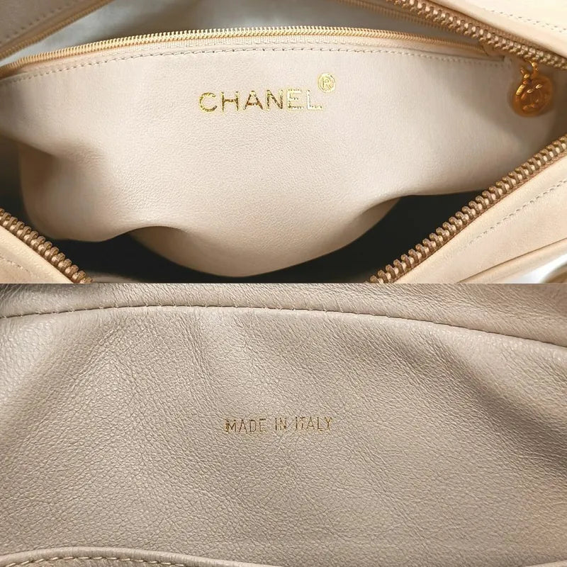 ra236-chanel-vintage-beige-lambskin-tessel-camera-bag