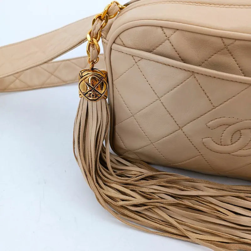 ra862-chanel-vintage-beige-lambskin-tassel-camera-bag