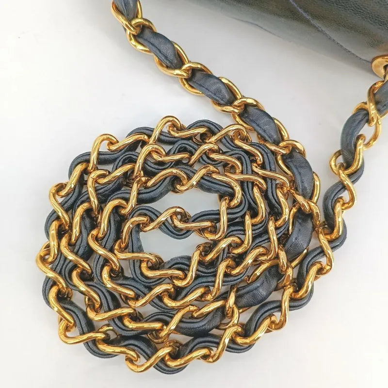 c407-chanel-vintage-navy-lambskin-chevron-mini-flap-bag