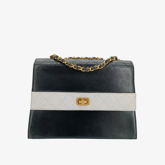 js323-chanel-vintage-bicolor-black-white-255-lambskin-trapezoid-flap-bag