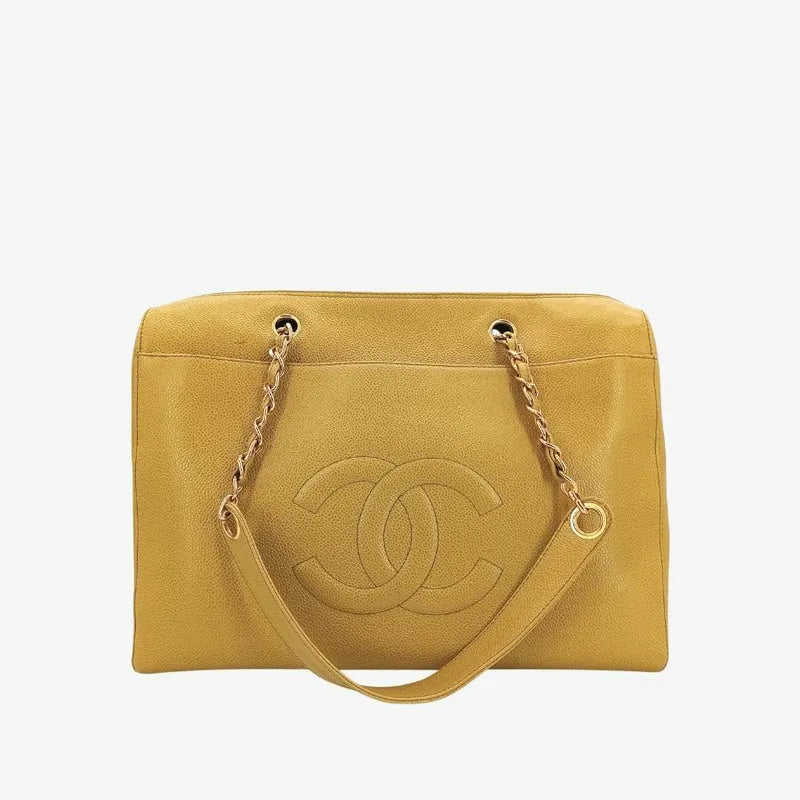 js337-chanel-vintage-yellow-caviar-leather-embossed-logo-tote-bag