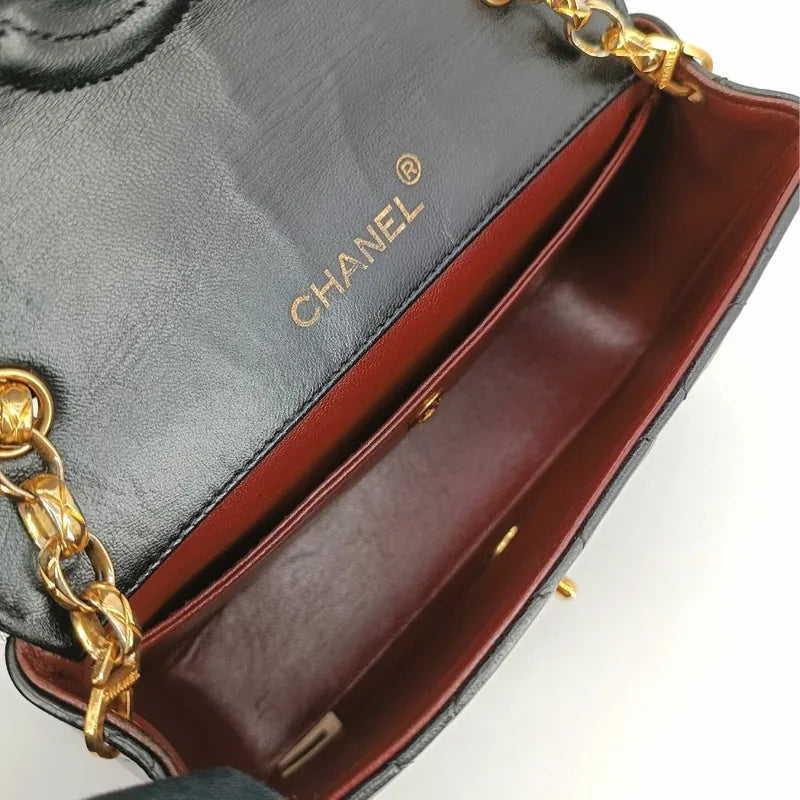 jt704-chanel-vintage-black-lambskin-gold-chain-flap-bag