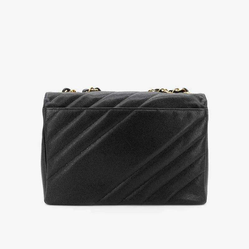 jq990-chanel-vintage-black-caviar-leather-jumbo-flap-bag