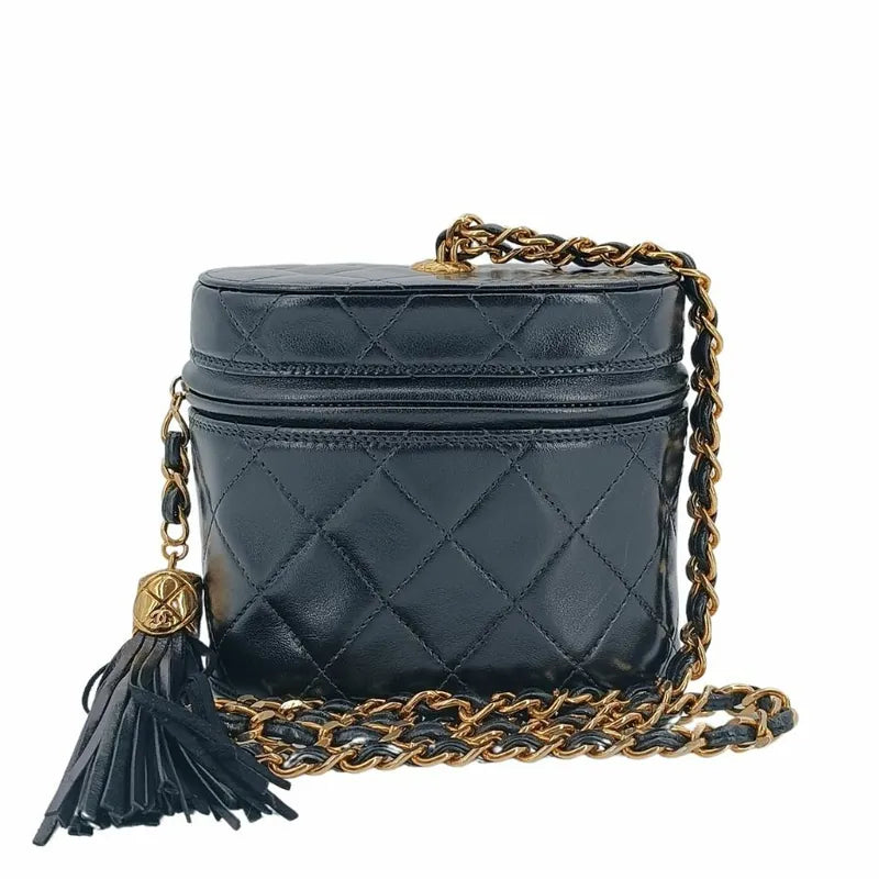 c302-chanel-vintage-black-lambskin-tassel-bucket-bag