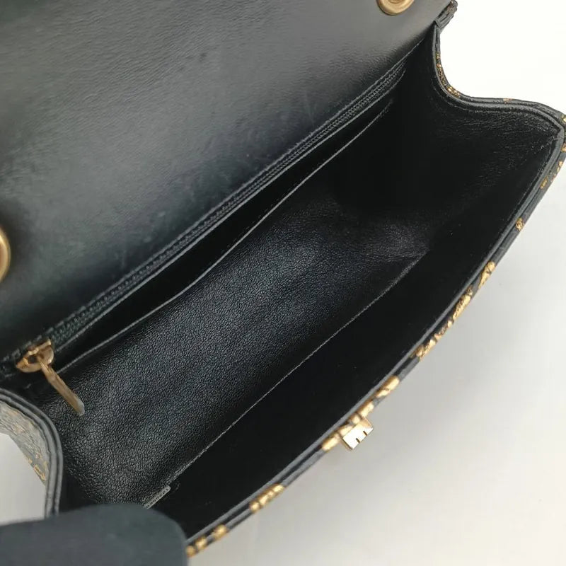 90190312-chanel-black-and-gold-graffiti-calfskin-crocodile-embossed-255-flap-bag