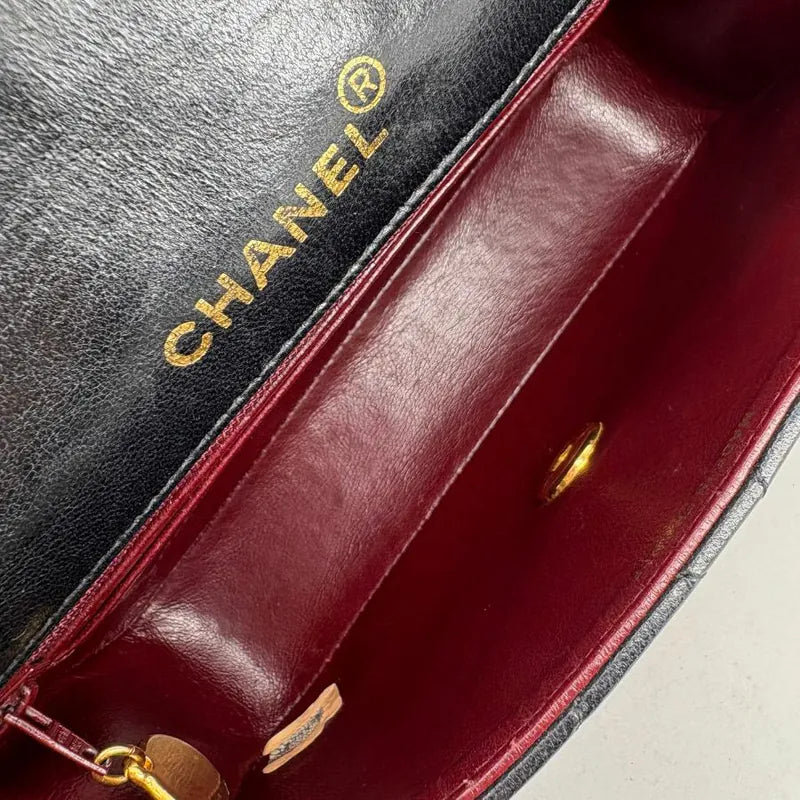 c575-chanel-vintage-black-lambskin-gold-chain-flap-bag