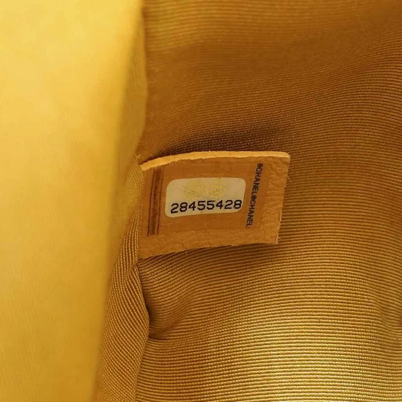 c226-chanel-boy-yellow-caviar-leather-flap-bag