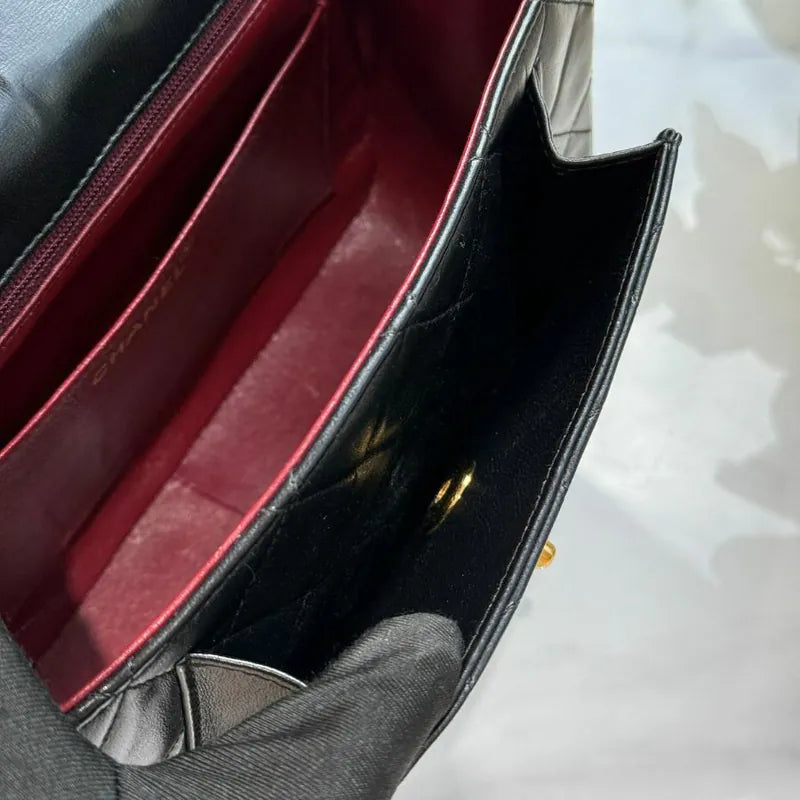 rc658-chanel-vintage-black-lambskin-gold-chain-flap-bag