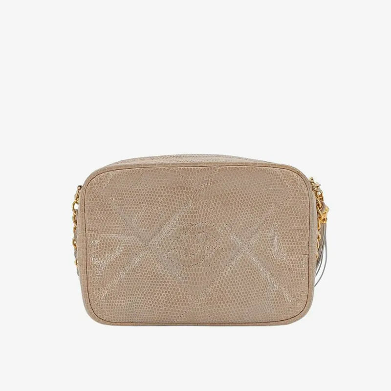 jah164-chanel-vintage-pink-lizard-skin-tassel-camera-bag
