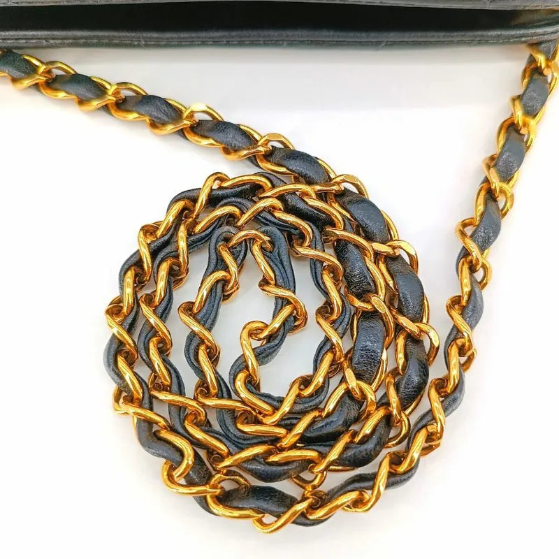 jt293-chanel-vintage-black-lambskin-chevron-handbag