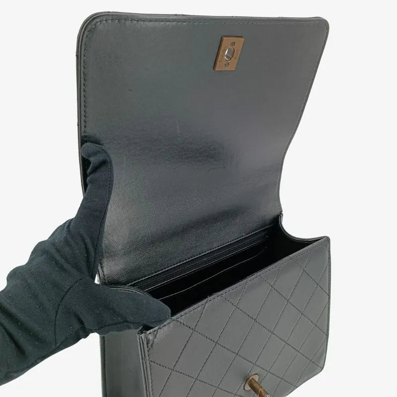 ra659-chanel-vintage-black-calfskin-quilted-handbag