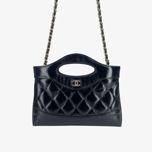 C667 - CHANEL Black Shiny Calfskin Nano 31 Bag