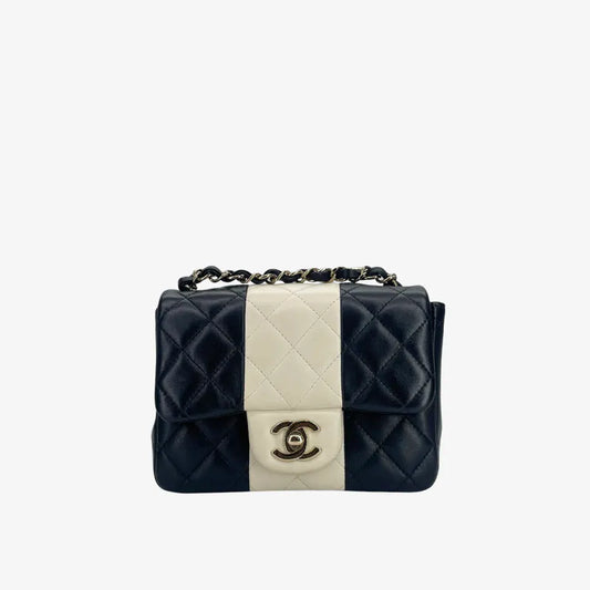 C665 - CHANEL Black White Lambskin Mini Rectangular Flap Bag