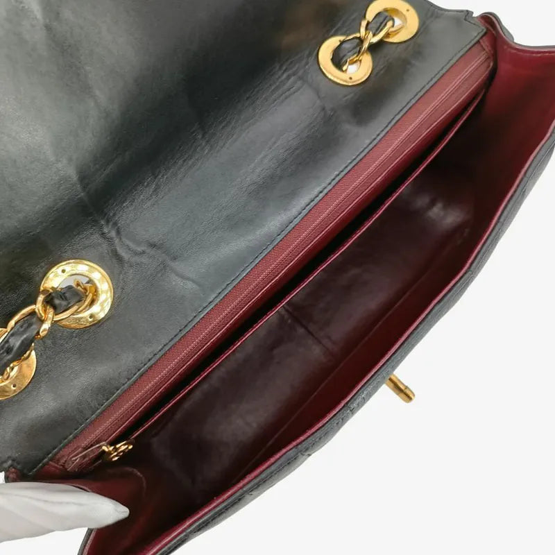 ra337-chanel-vintage-black-lambskin-vertical-jumbo-flap-bag