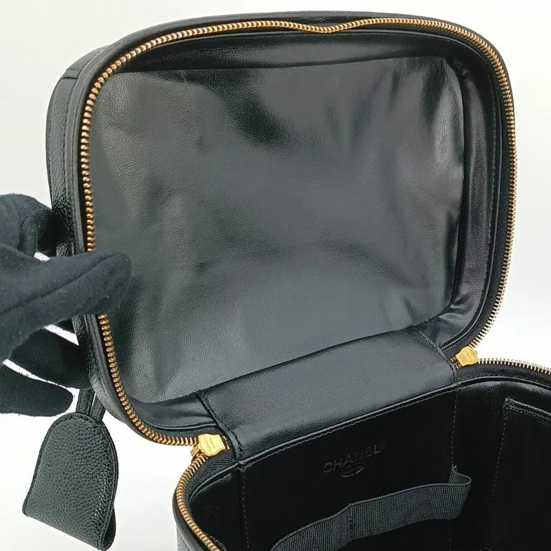 js502-chanel-vintage-black-caviar-embossed-logo-cosmetic-bag