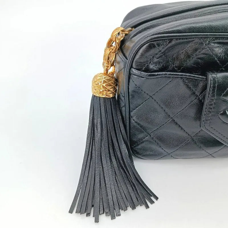 jt762-chanel-vintage-black-lambskin-gold-chain-tassel-camera-bag