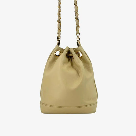 jw565-chanel-vintage-beige-lambskin-golden-ball-mini-bucket-bag