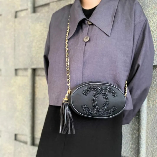js561-chanel-vintage-black-satin-oval-camera-bag